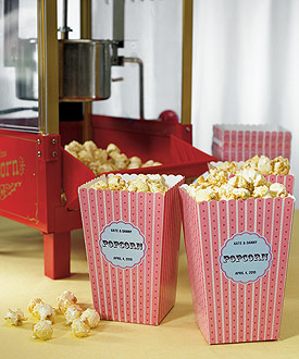 Popcorn fun and snacks with a movie themed party.