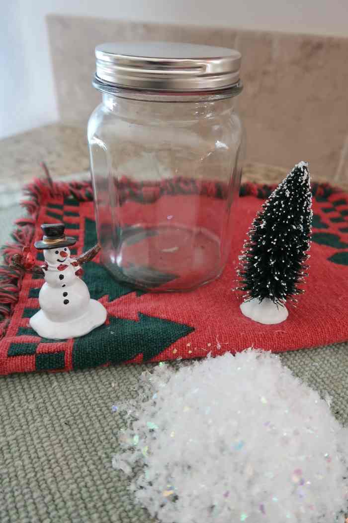 Waterless snowman globe supplies needed | how to make a waterless snowman globe | christmas craft